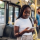 Experiential marketing promotional marketing with a lady on a bus on her phone engaging